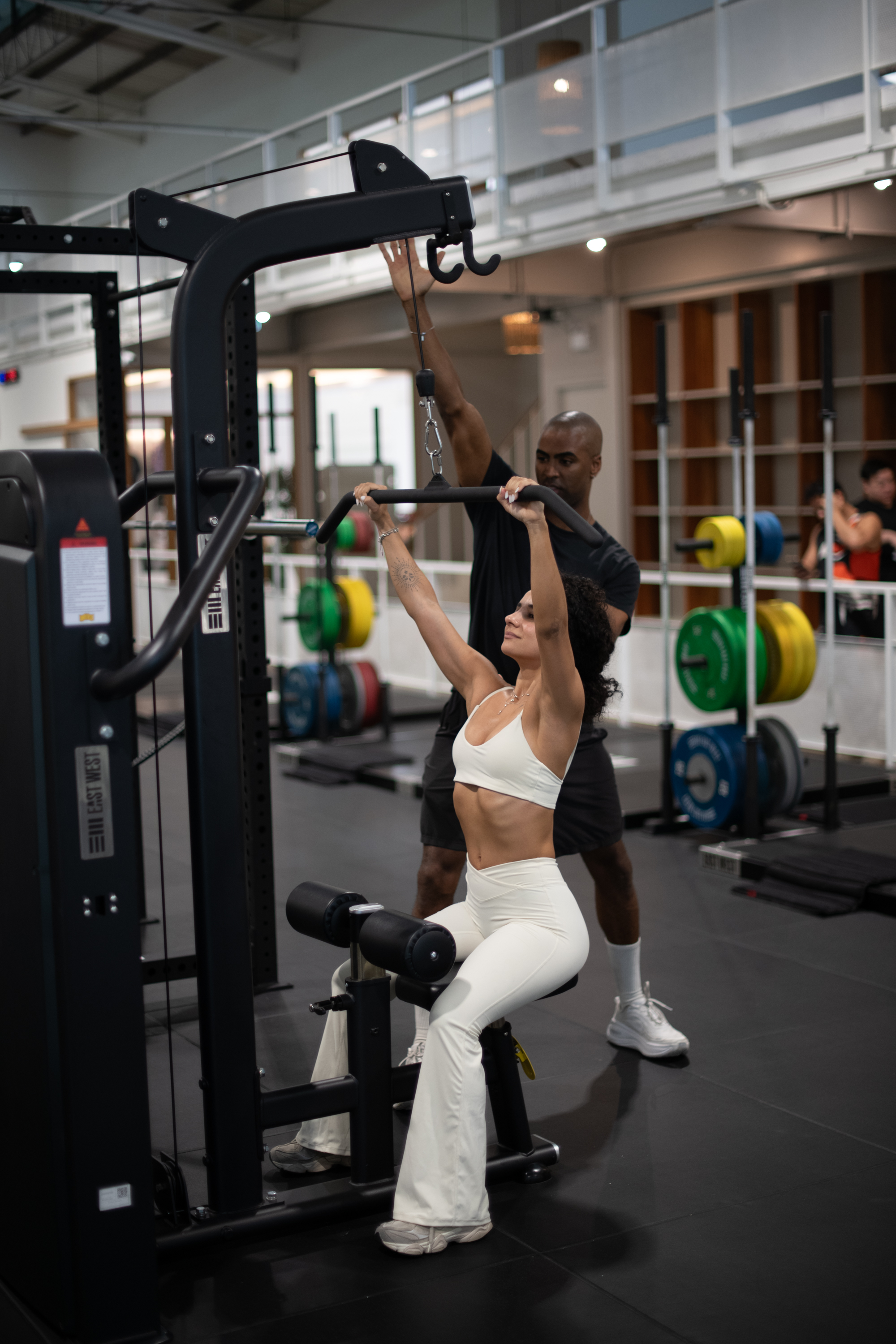 Jonathan coaching a client through a mobility drill
